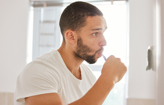 Man brushing his teeth